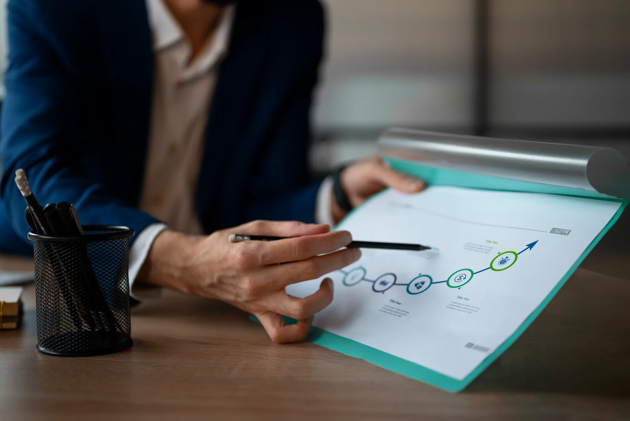 person-office-analyzing-checking-finance-graphs